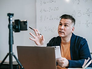 Teacher leading an online class