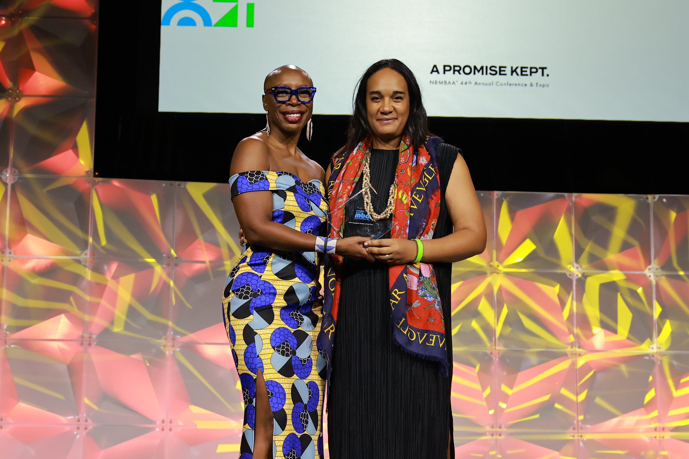 Mitsu Frazier accepting the 2022 National Black MBA Association® (NBMBAA®) Academic Partner of the Year award