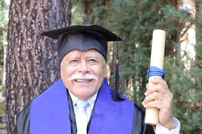 elderly man graduating