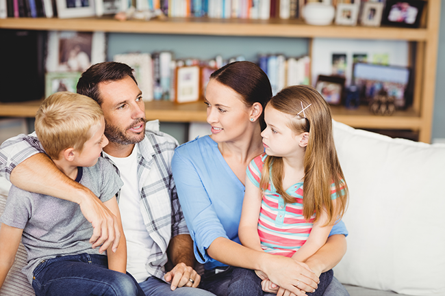 Father talking to his family