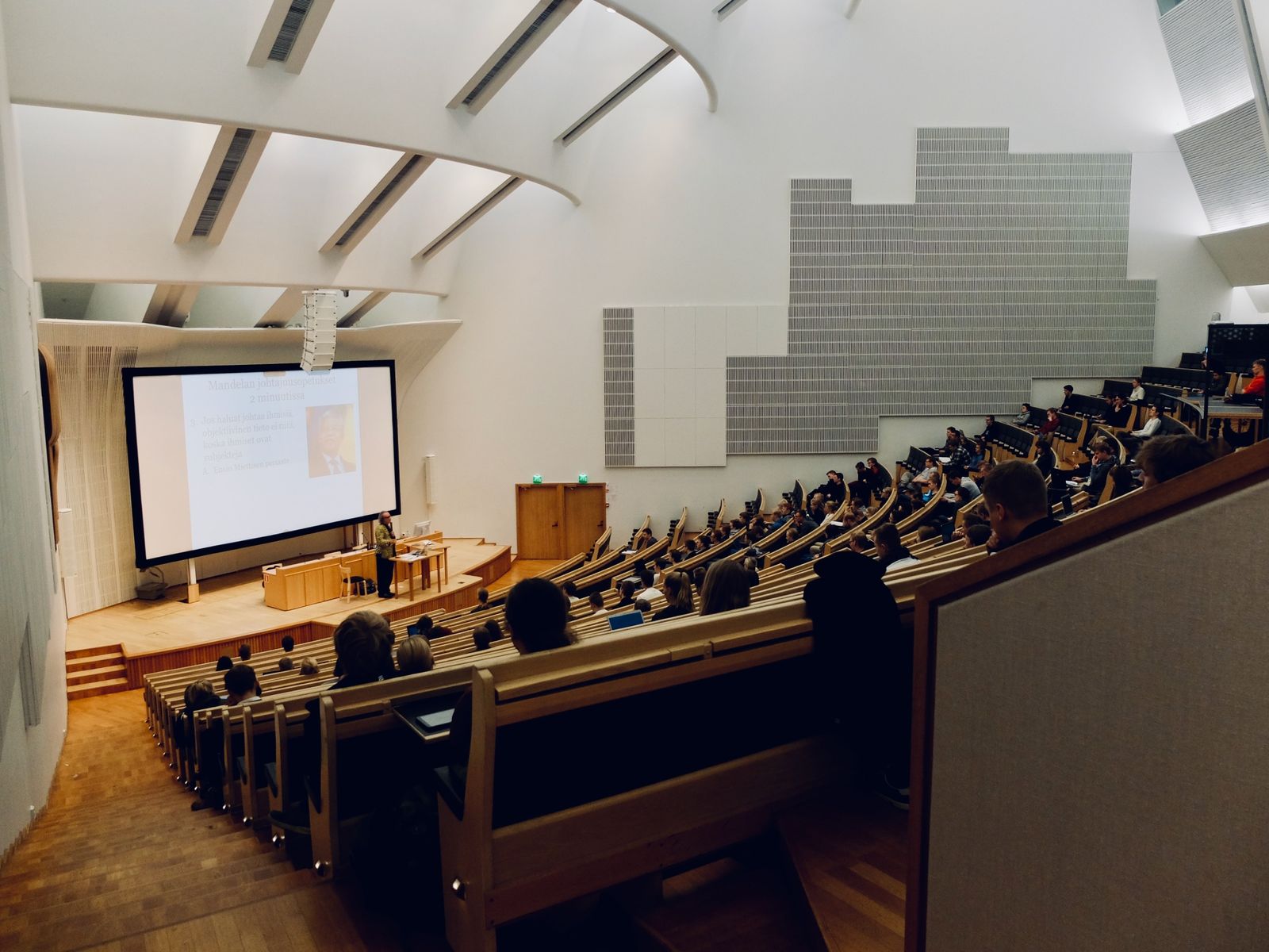 empty classroom with a projector at the front