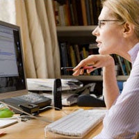 Online student sitting at desk