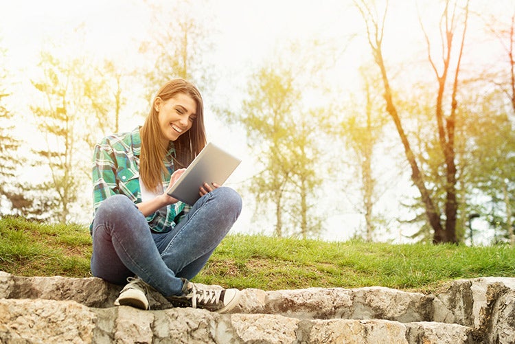 student working at park