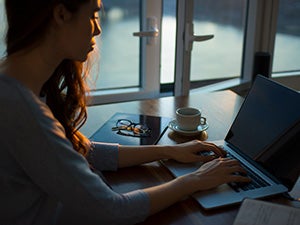 Student at home, on a laptop