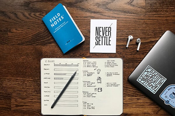Notebooks and a laptop