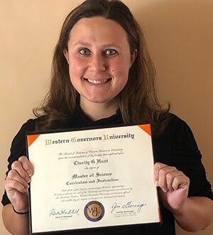 Cherity Hunt with diploma