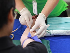 Patient having blood drawn