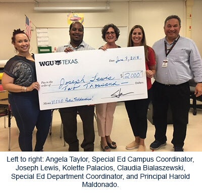 Joseph Lewis receives his scholarship check