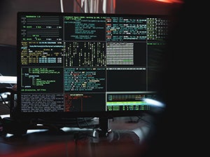 Monitor showing computer code