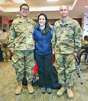 Dr. Cindy Garcia greets soldiers during Operation Exodus.