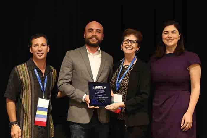 adel lelo receives award