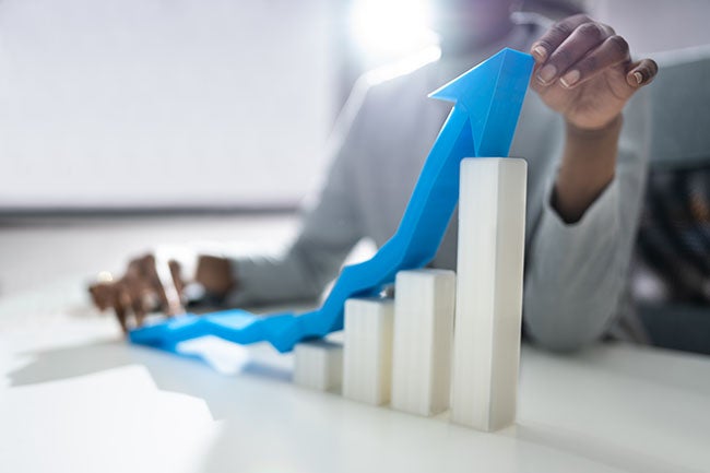 blue arrow pointing upward indicating growth