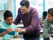 problem solving with technology High school licensed teacher working with students