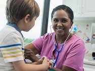 Licensed healthcare nursing graduate working with patient in hospital