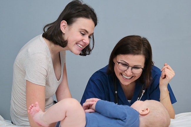 family nurse practitioner checking up on a child