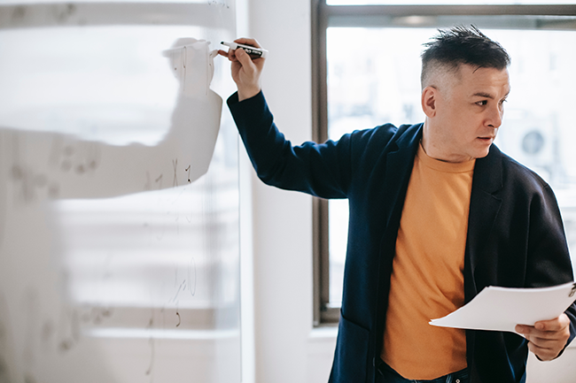 teacher at whiteboard