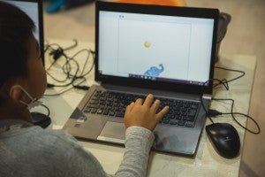 child using a computer learning game