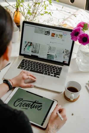 woman doing creative work online