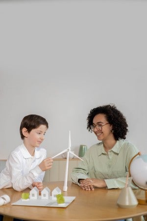 teacher showing student a turbine