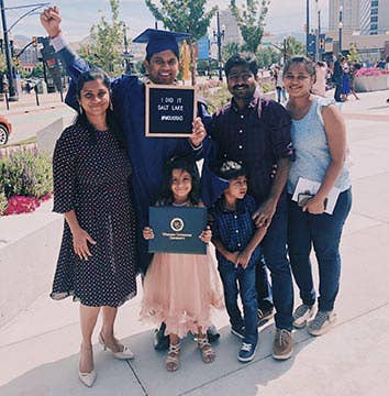 male graduate with 5 family members at SLC commencement 2019