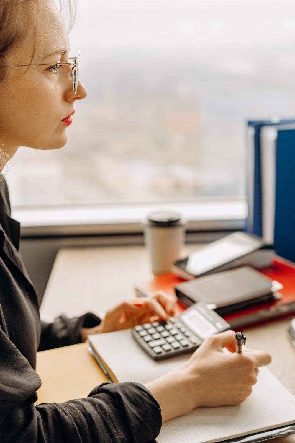 Girl looking at computer and working