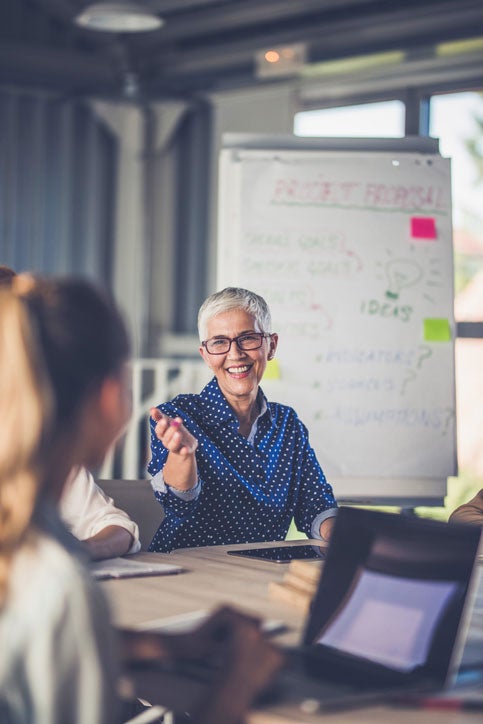 Mature woman in a corporate training setting
