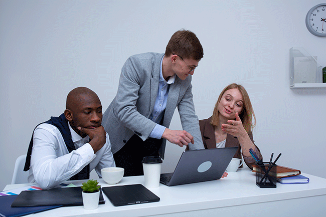 Women working at her desk in business setting