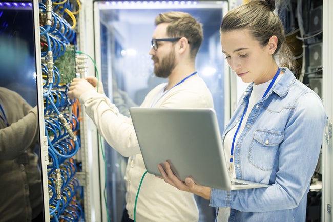 Man and woman in server room