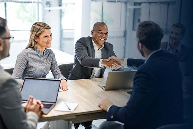 Business people meeting around a table