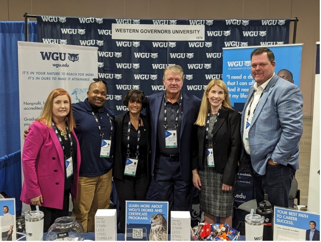 Group of men and women coworkers having a friendly meeting at a conference