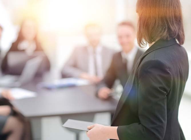 business women leading a meeting
