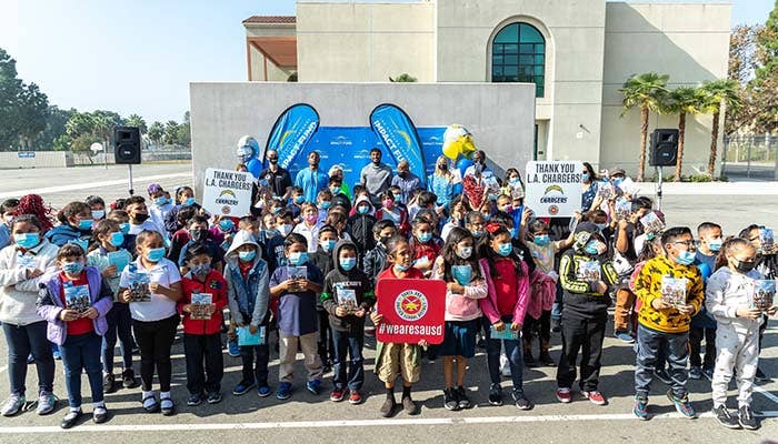 The LA Chargers and WGU recently partnered with LAUSD for a First Books Event to donate books to Heninger Elementary school students in Santa Ana, CA. 