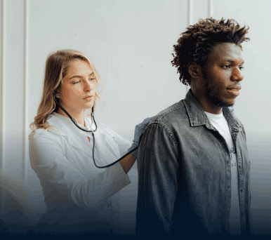 Medical professional listens to a patient's lungs