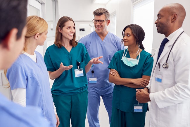 Group of healthcare professionals having a discussion