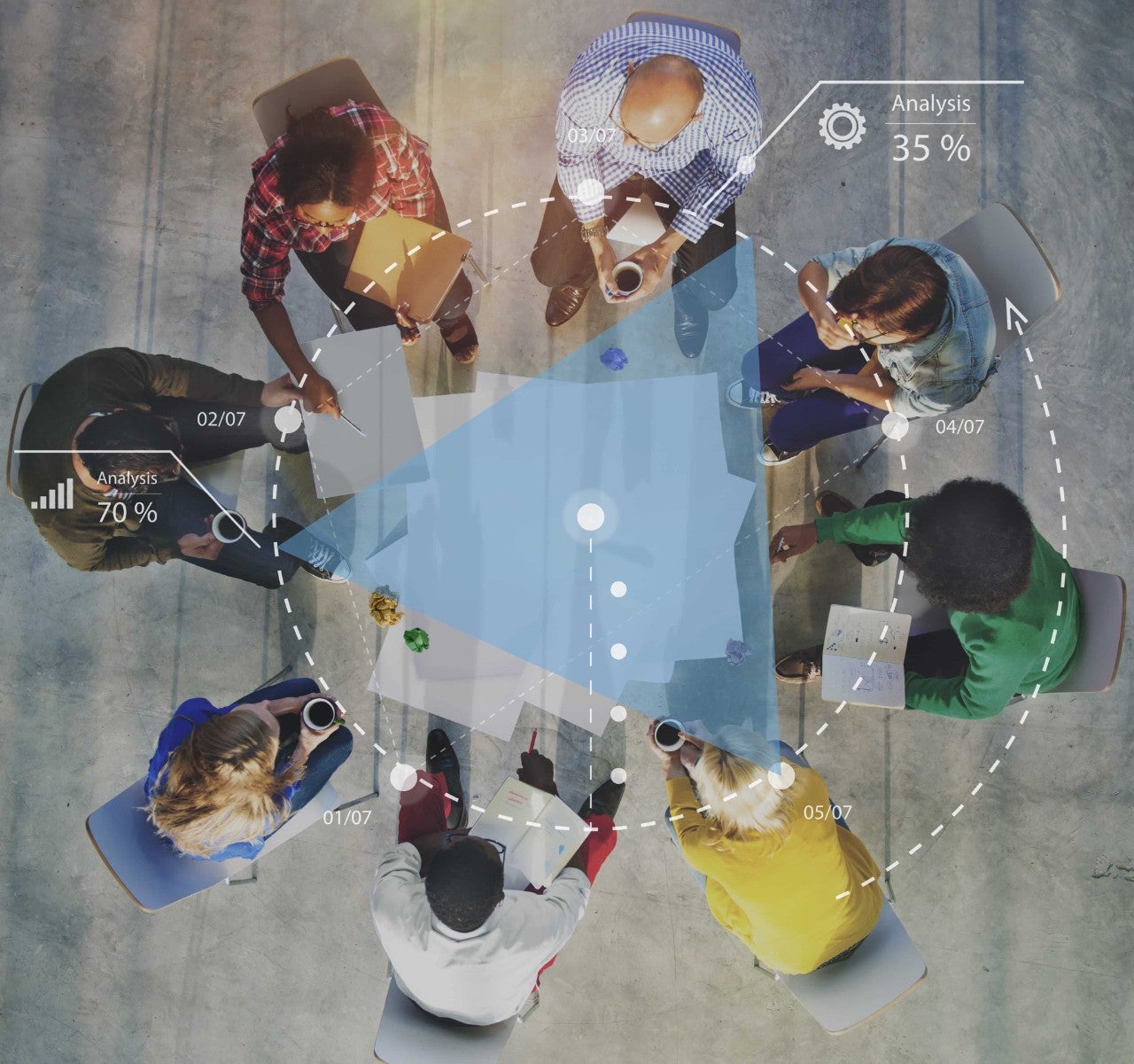 group of people sitting around table