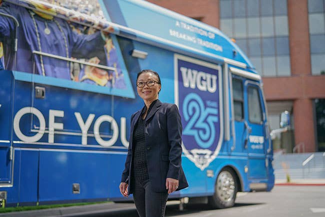 Jane Chung in front of WGU Bus